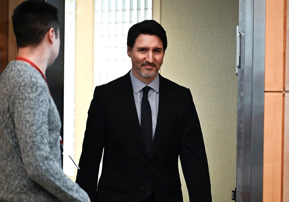 Prime Minister Justin Trudeau arrives to sign a book of condolences for former U.S. President Jimmy Carter at the U.S. Embassy in Ottawa, on Friday, Jan. 3, 2025.